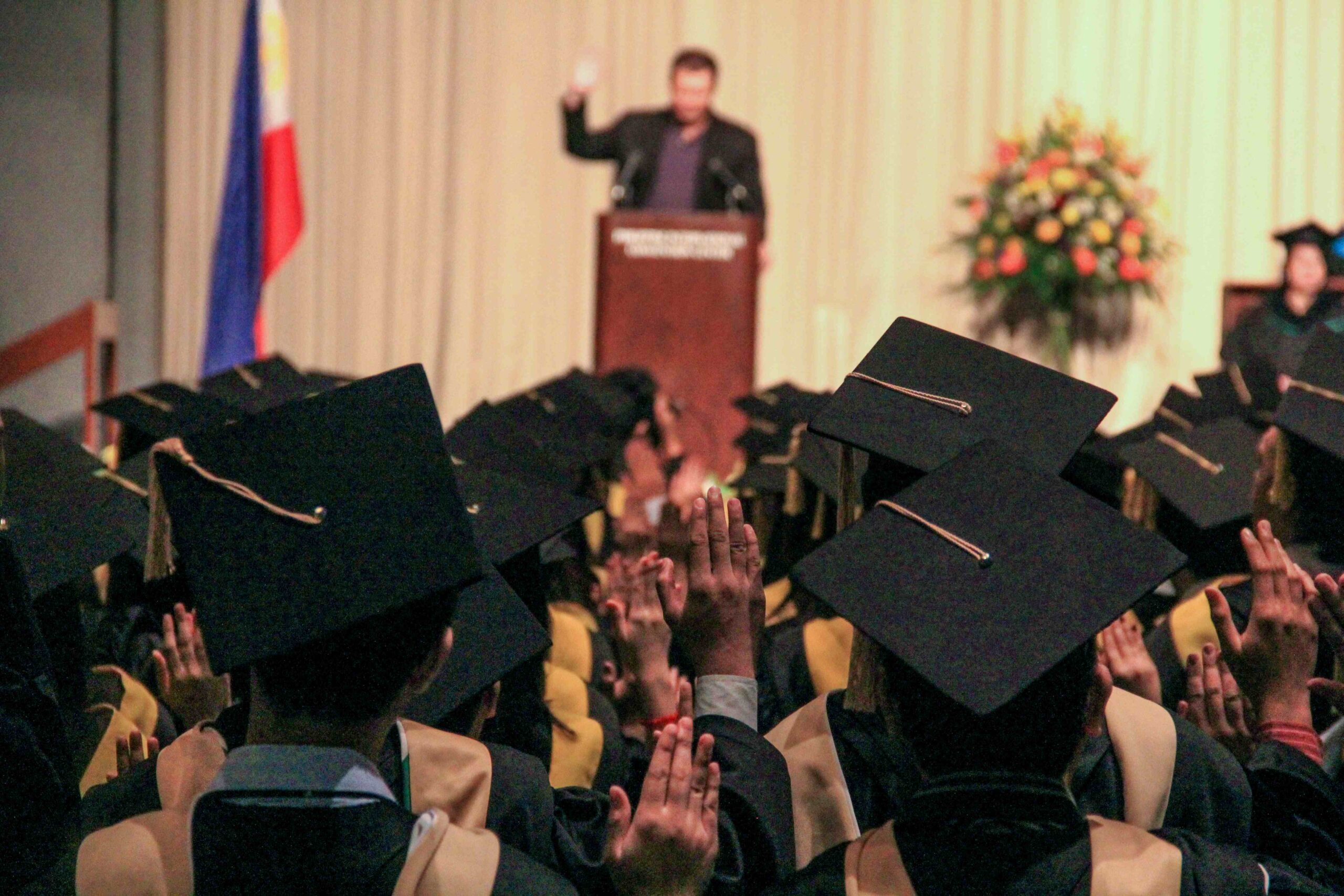 Students graduating after a scholarship